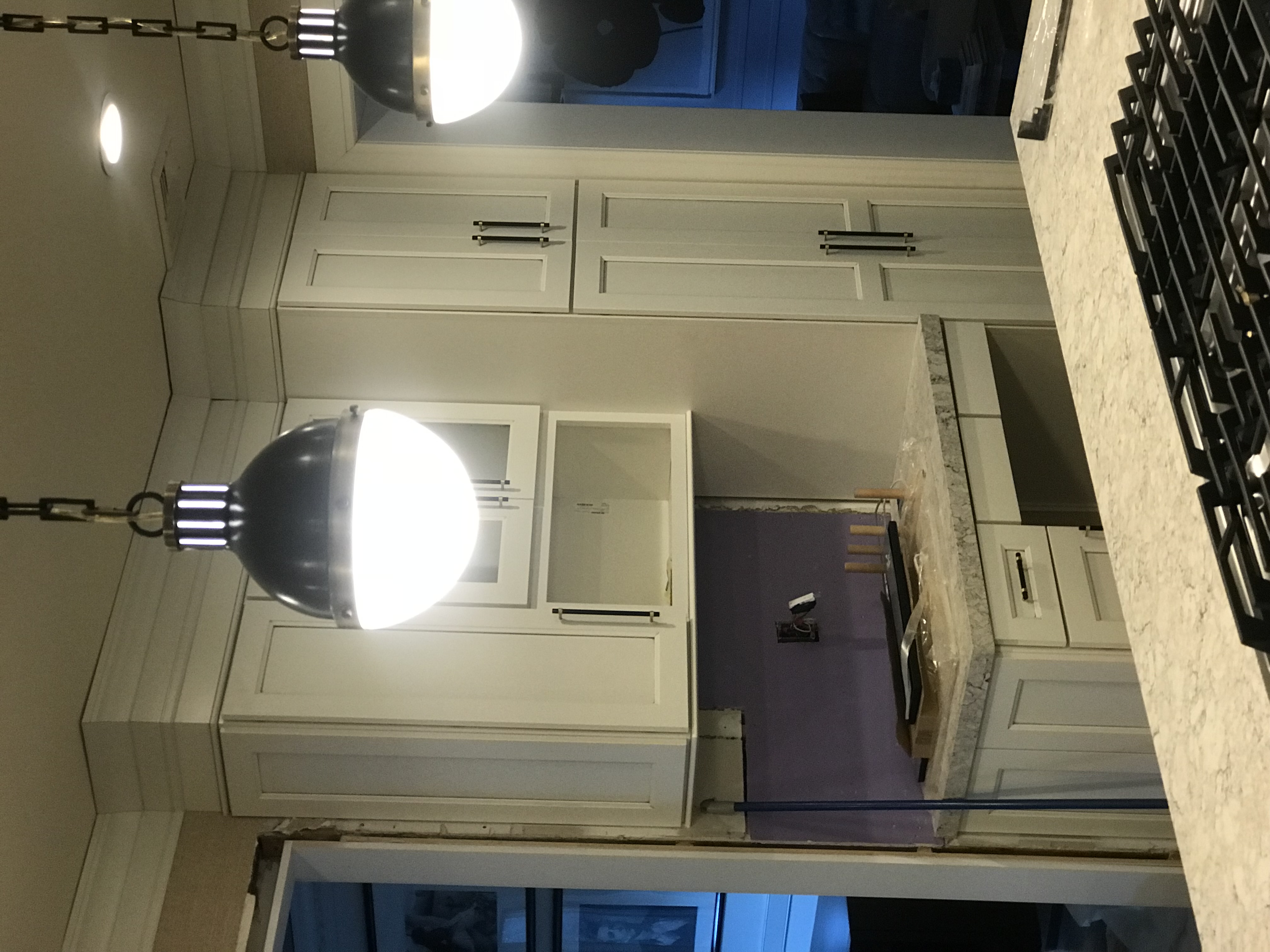 Marble bathroom with large mirror